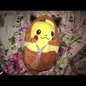 Pikachu plushie with Eevee costume